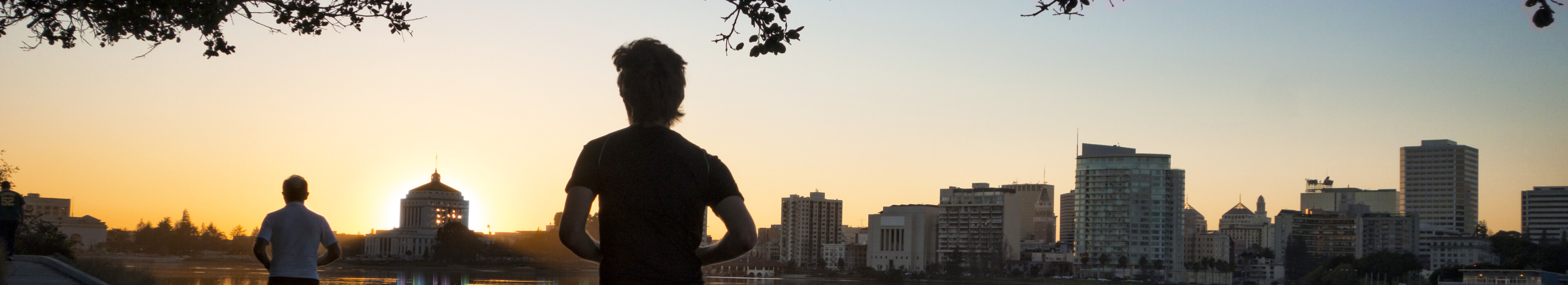 Woman standing in sustainability facility holding a tablet