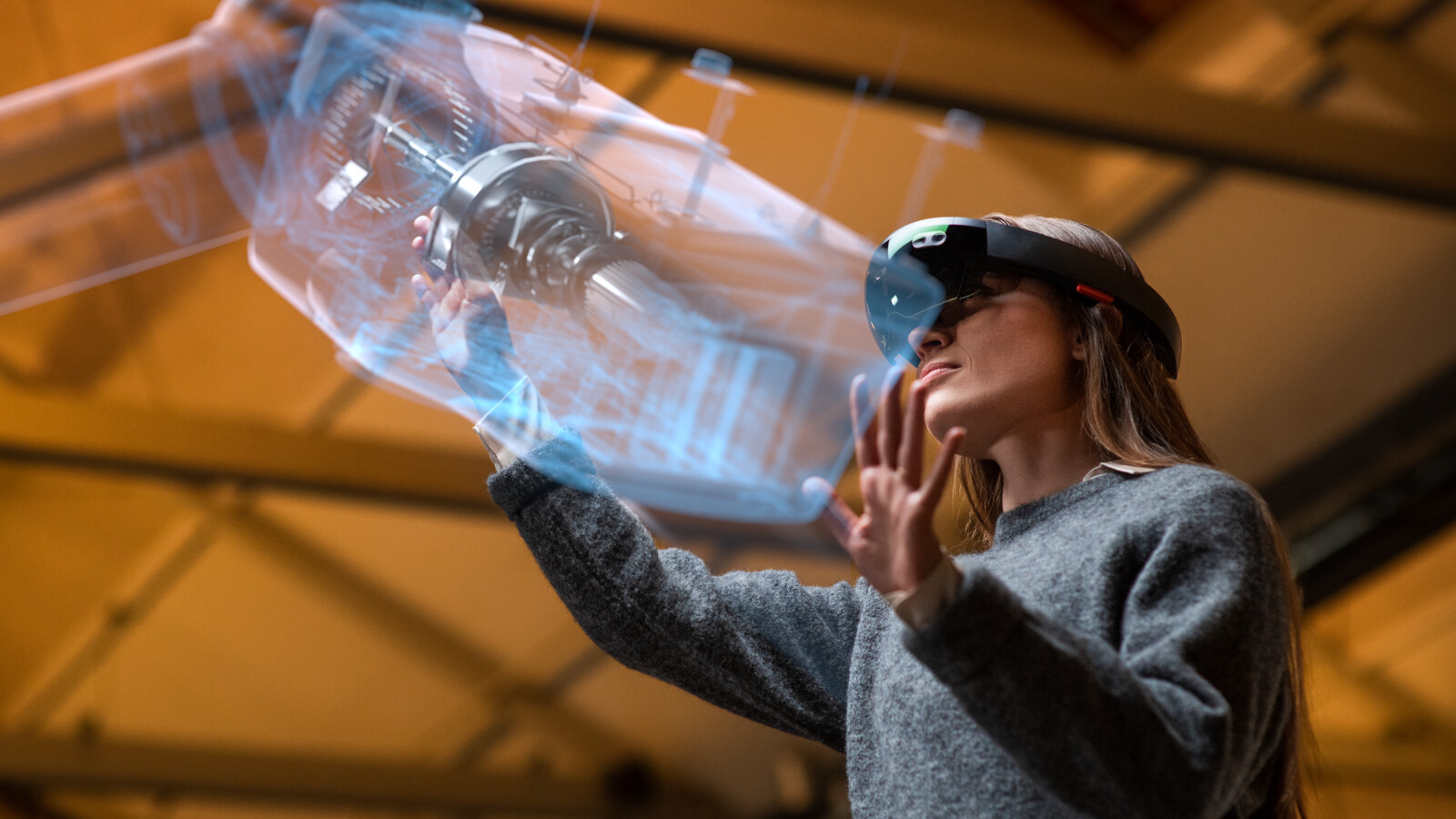 A female professional working with 5G digital twin technology and Industry 4.0