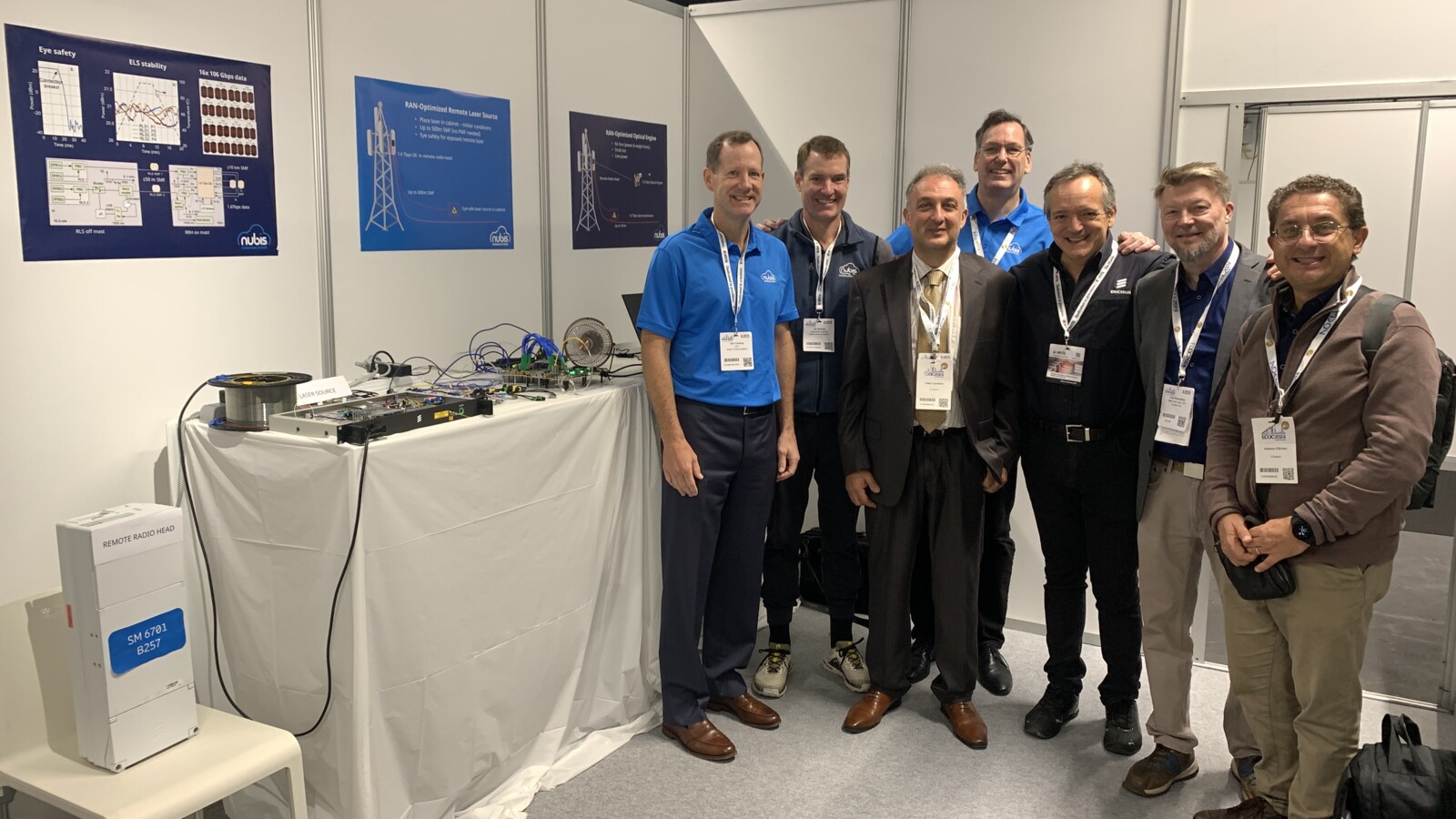 Demo team at ECOC 2024 showing co-packaged optics
