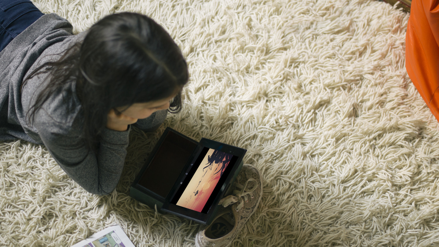 Girl lying on the carpet