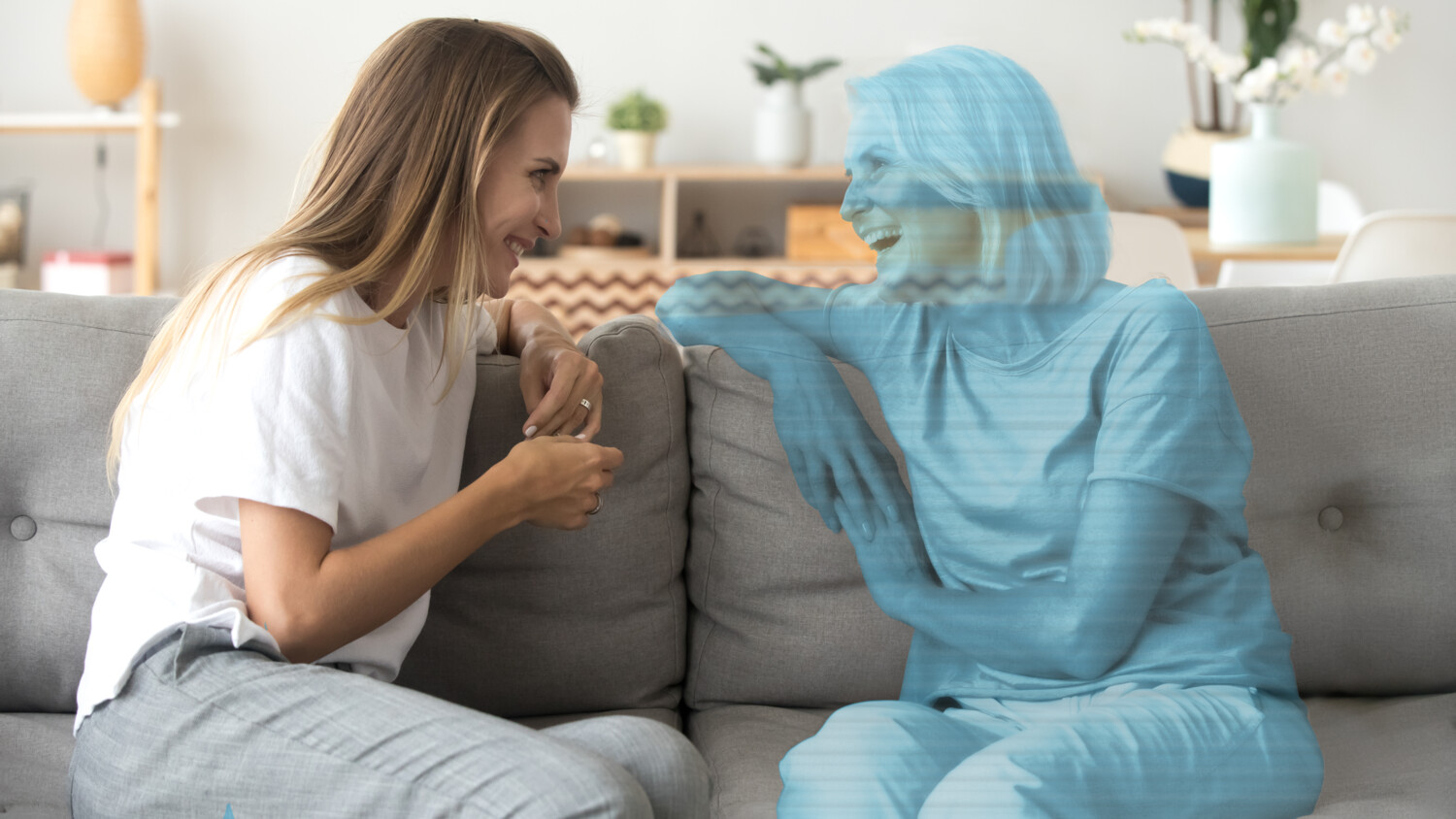 Woman talking with a hologram