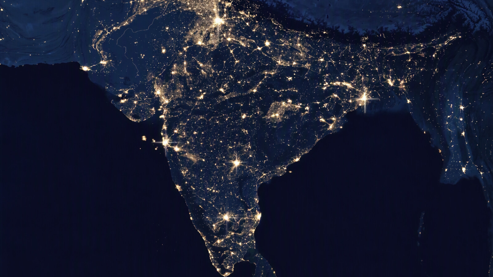  Satellite view of illuminated network connections across India at night.