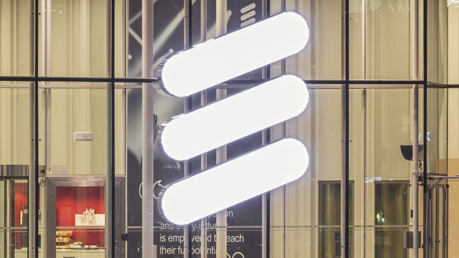 Ericsson logo signage on a large window.