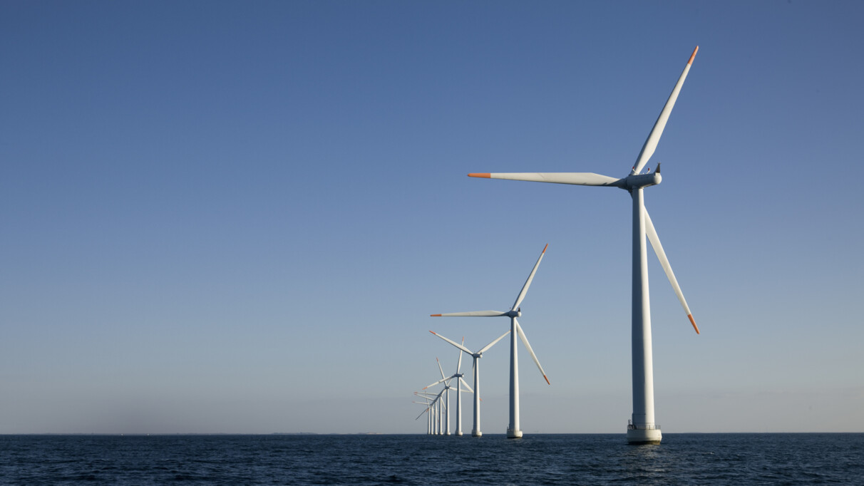 Wind turbines in ocean.