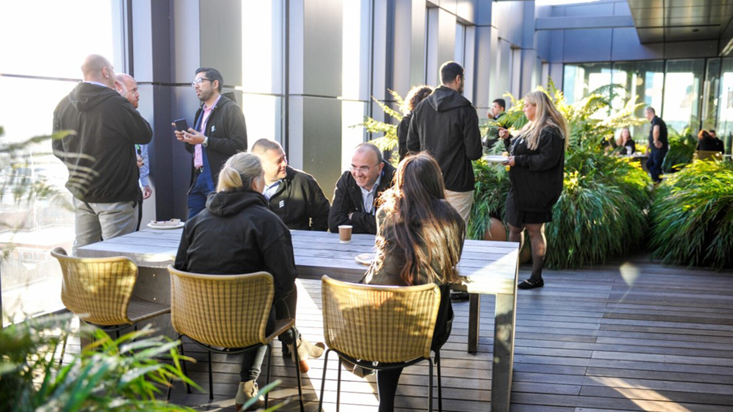 Colleagues talking on a coffee break.