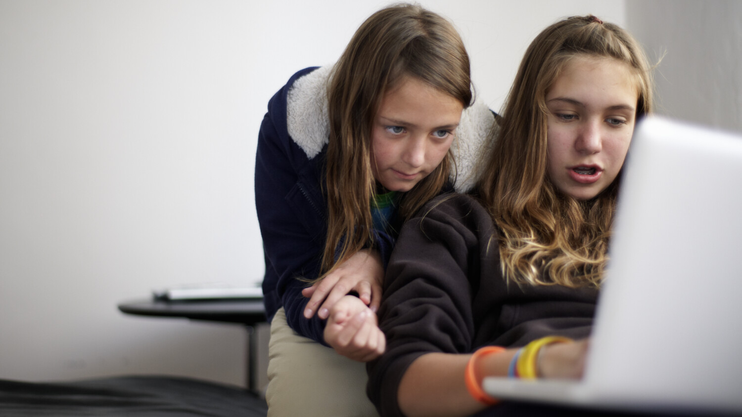 Girls watching laptop