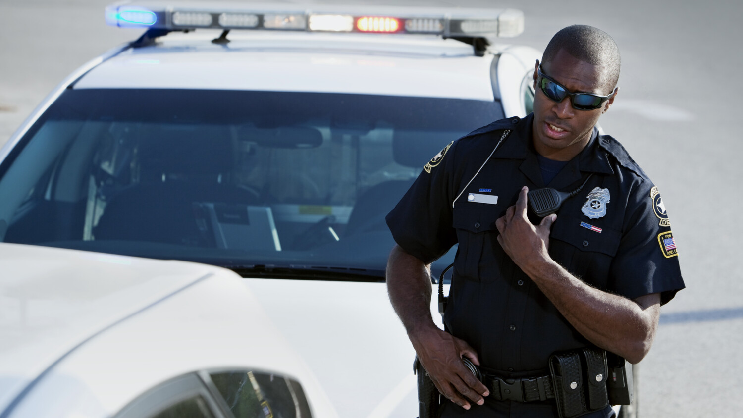 policman using mission critical device