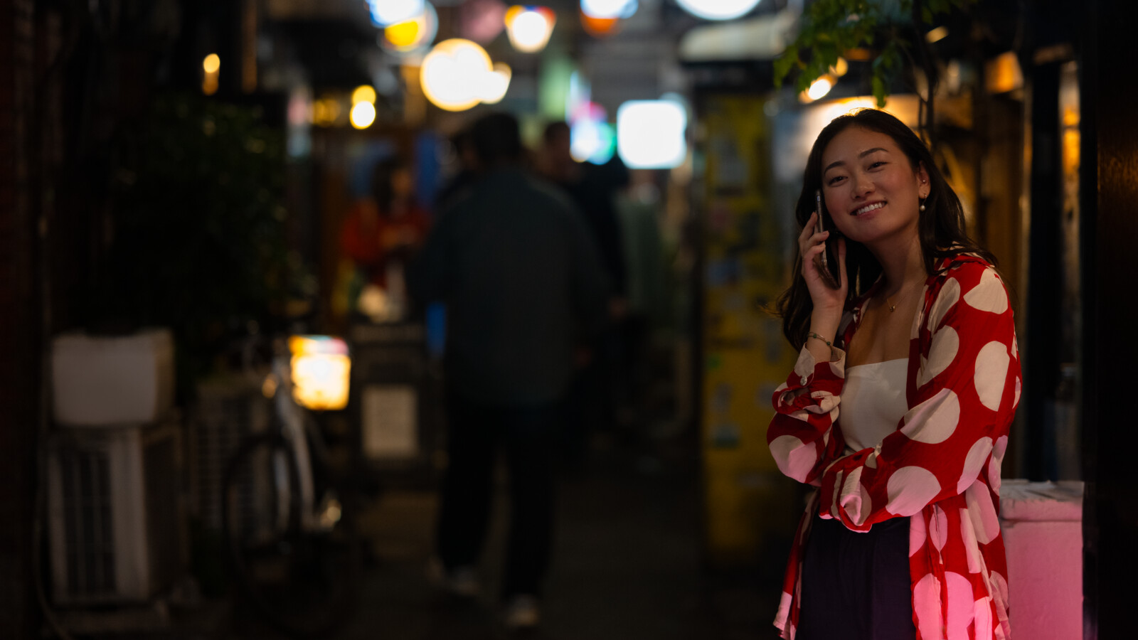A woman talking on the phone.