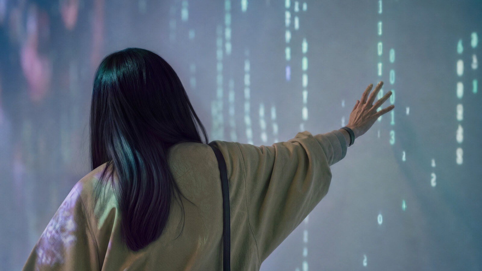 Woman interacting with immersive experience