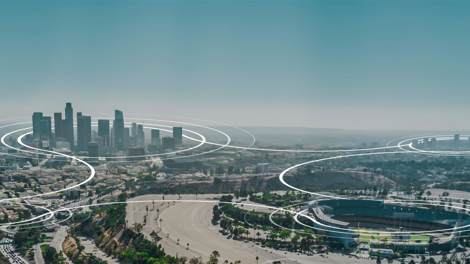 5G RAN slicing overlay graphic on image of a city.