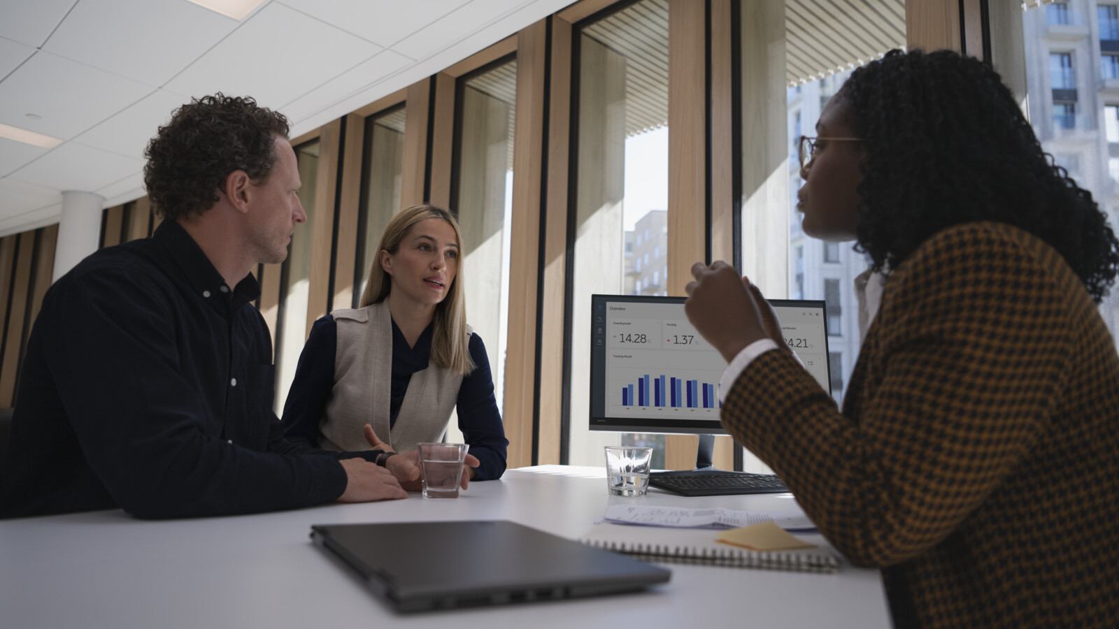 Finance manager talking to customers