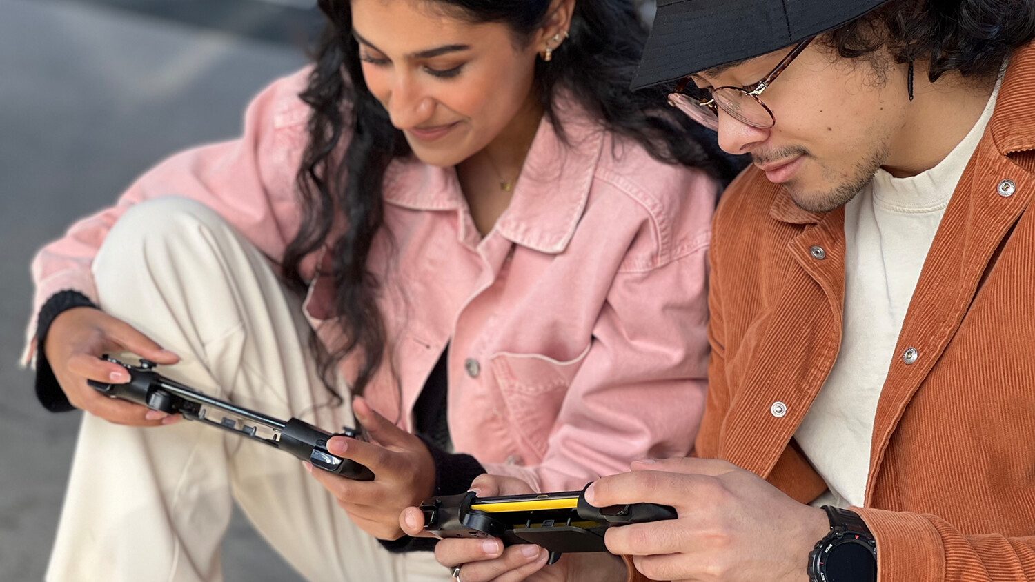 Couple gaming on mobile devices