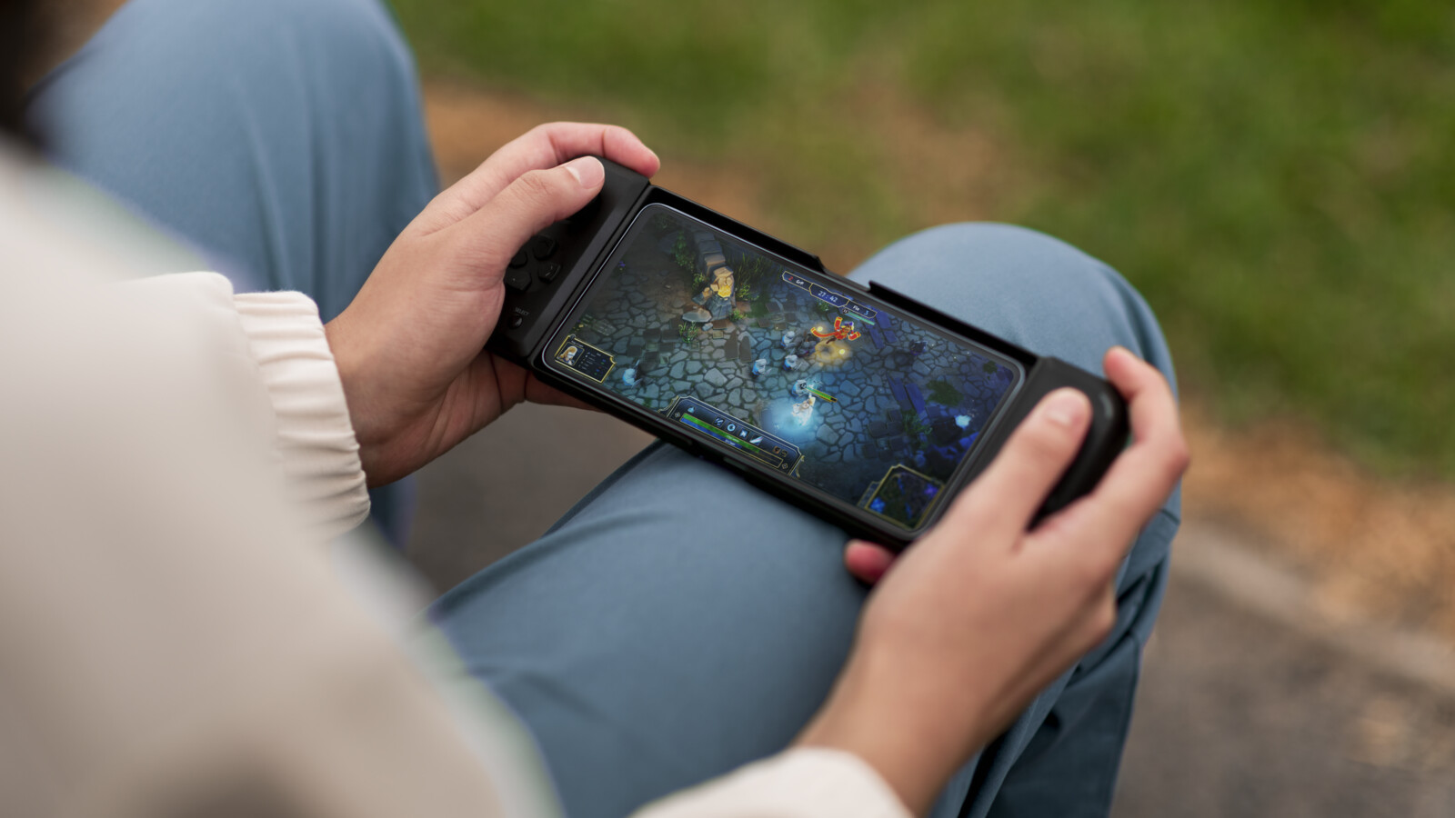 A man playing a game over 5G on his phone