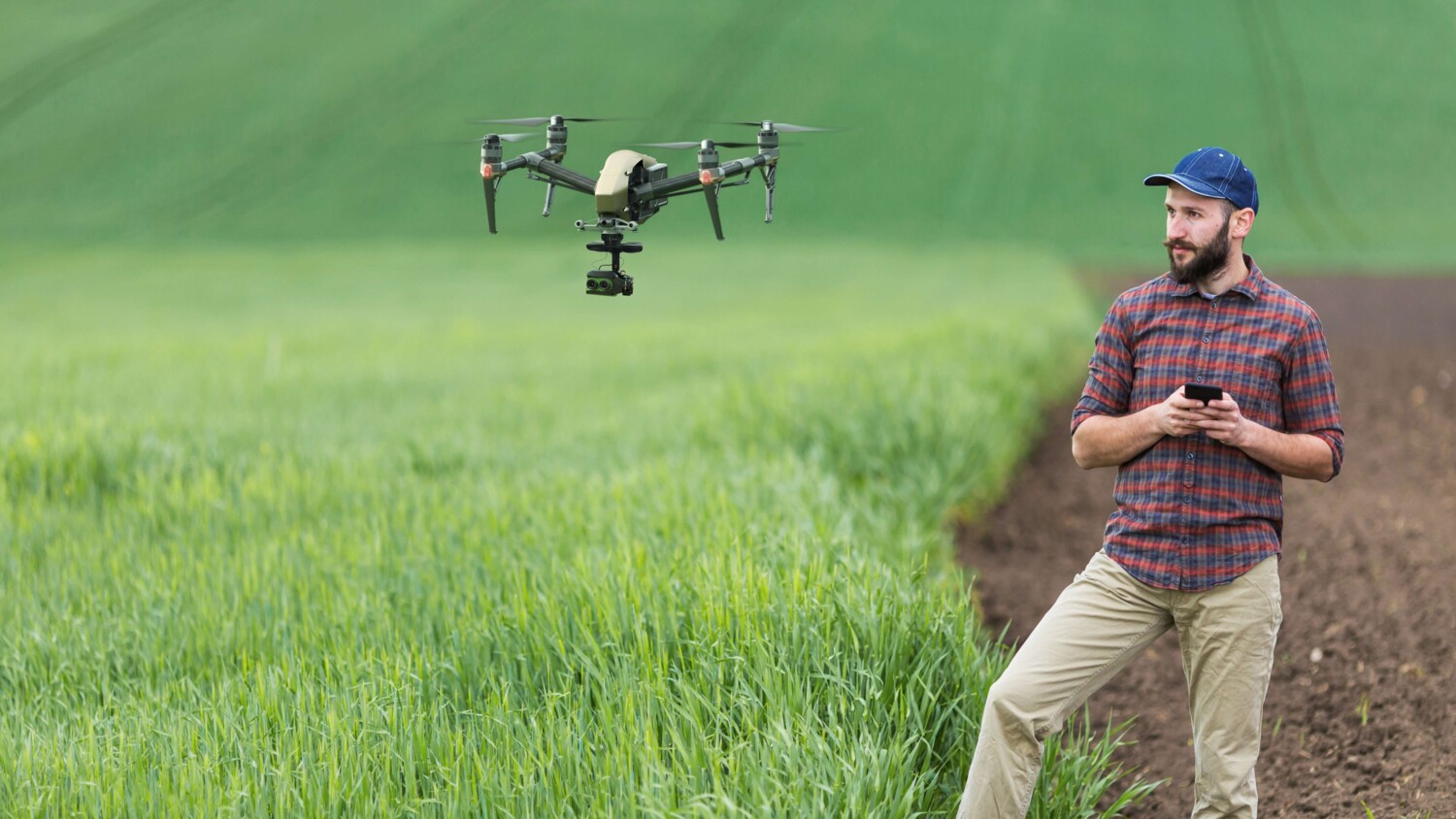 Farmer using drone