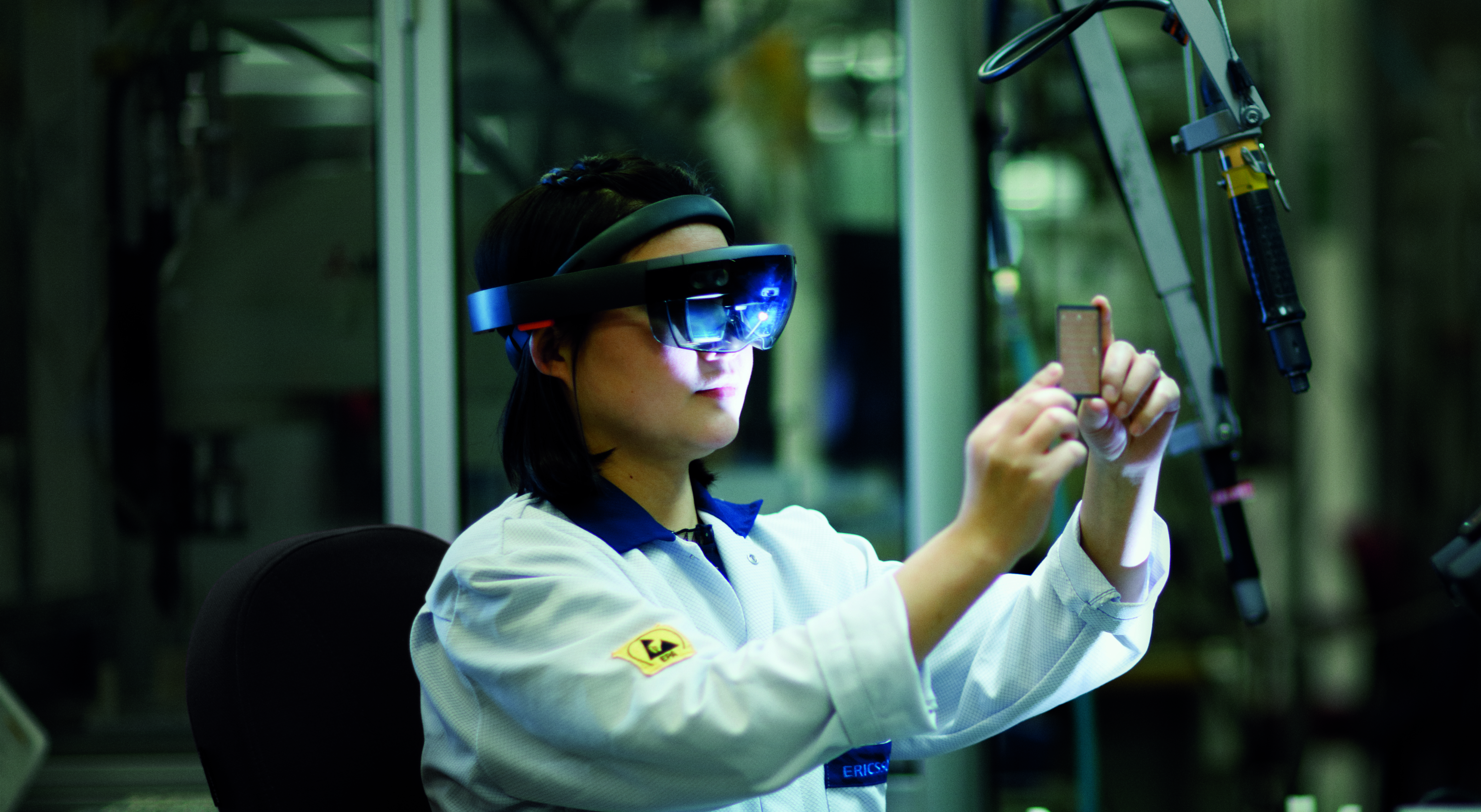 Woman in factory in VR glasses