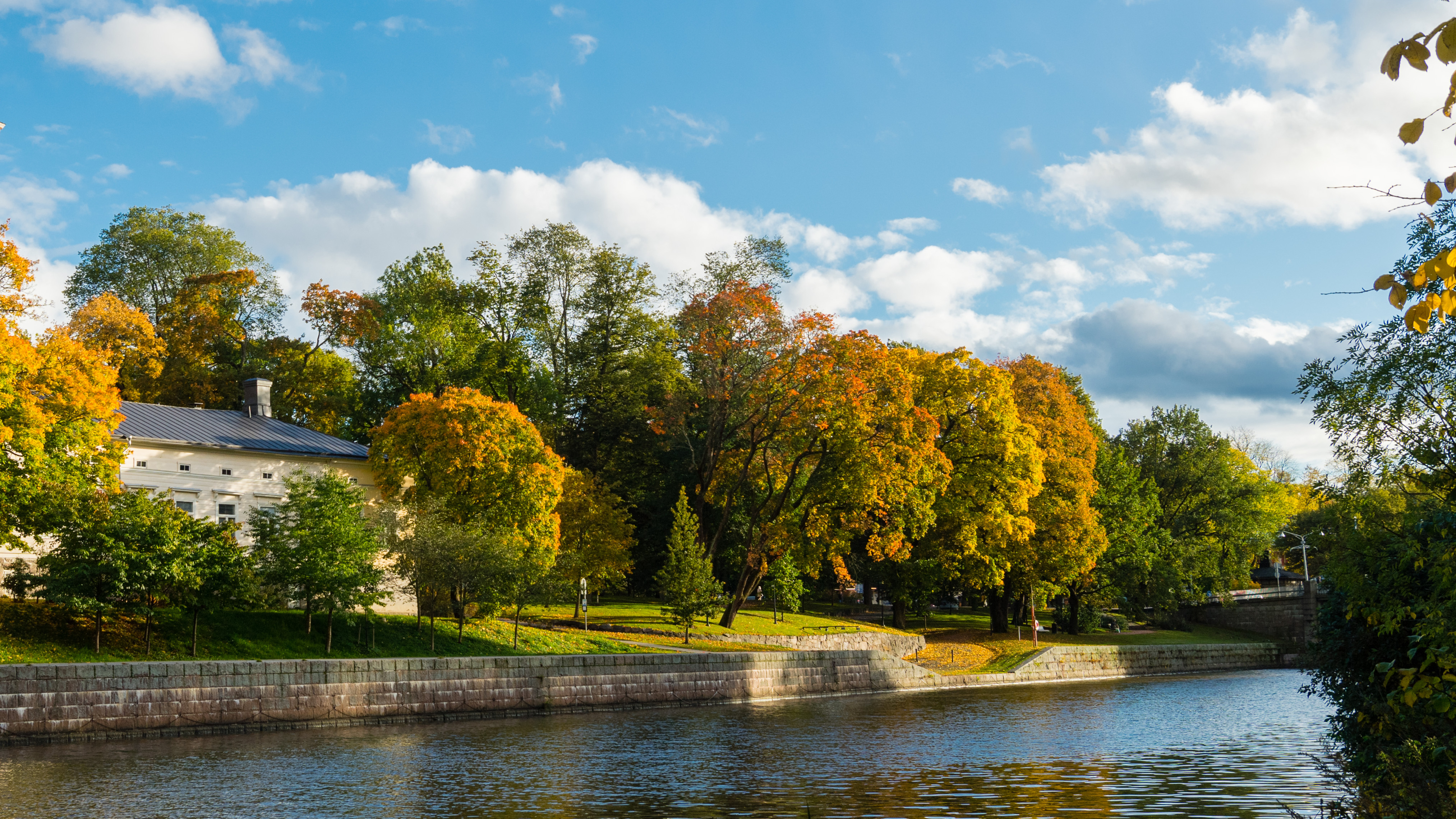 Autumn landscape beside a river.