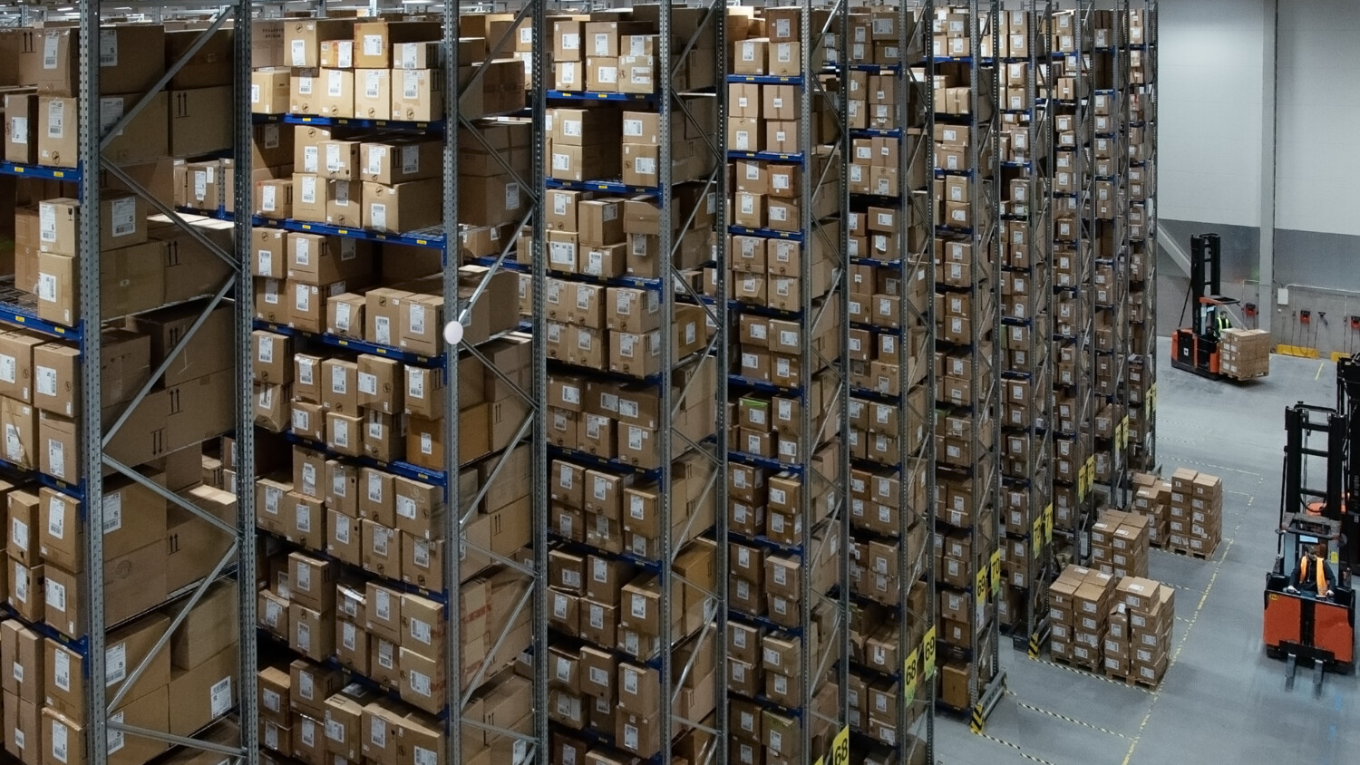 A warehouse with tall shelves.