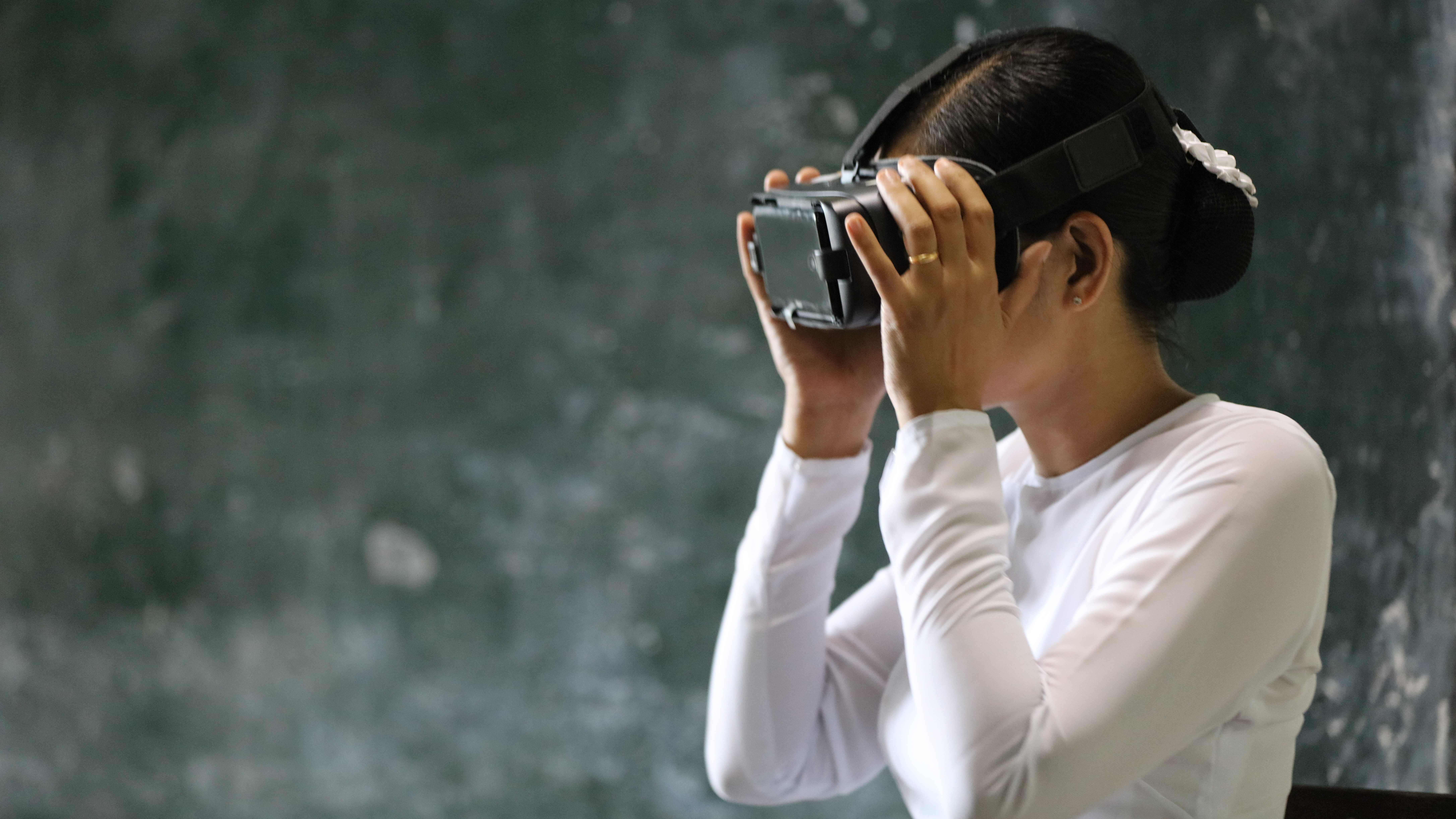 Young woman with VR glasses