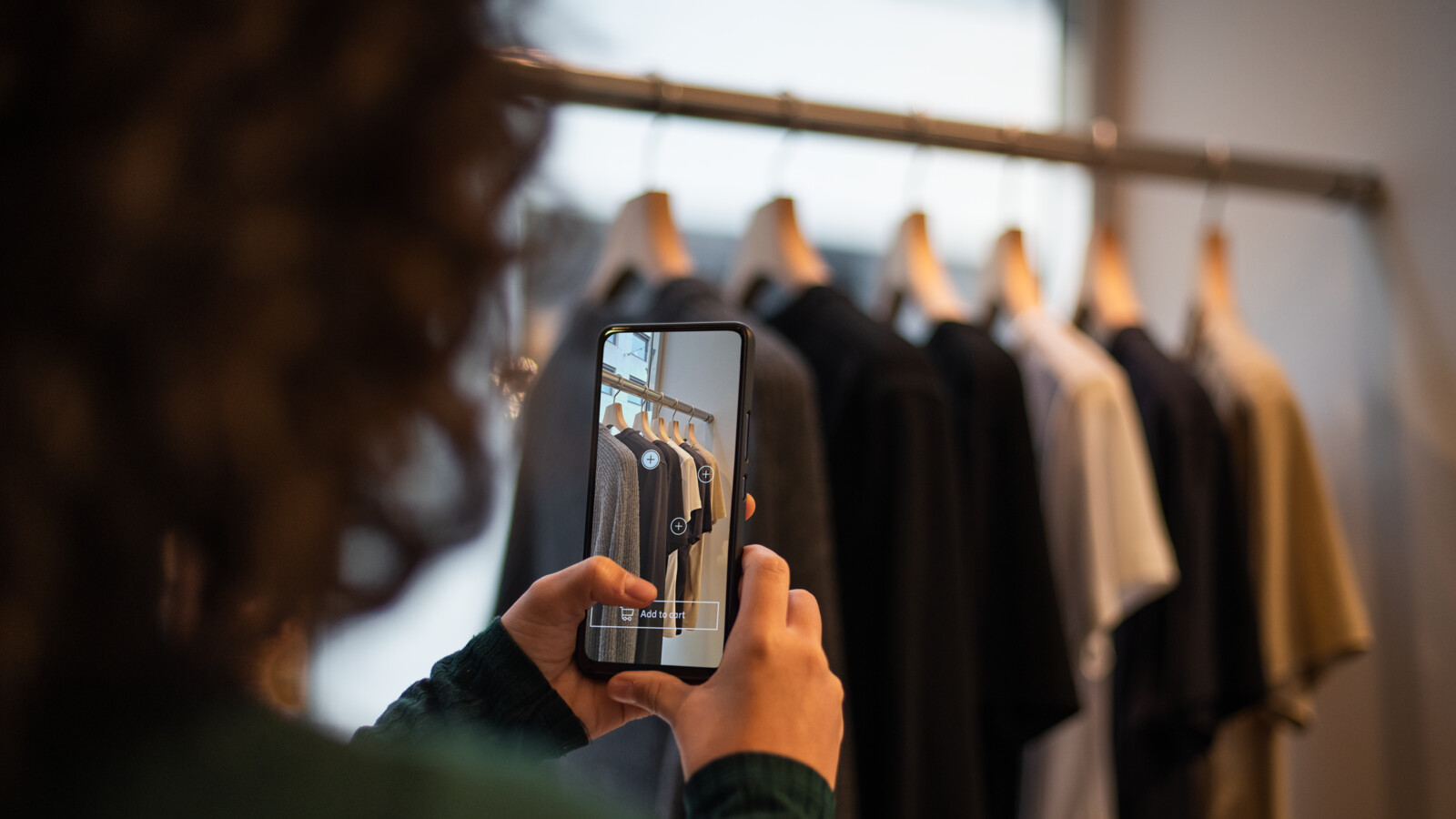 A woman using augmented reality in a store