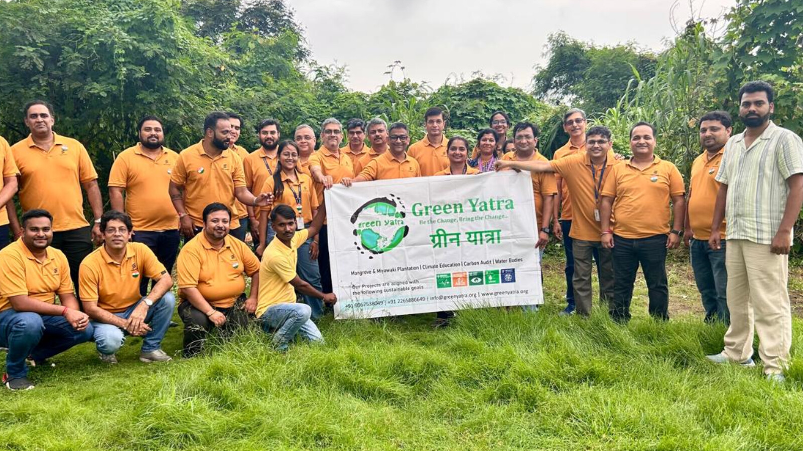Employees volunteering together for Green Yatra in India.