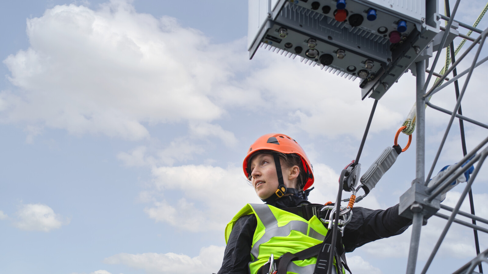 Woman tower climb ERS equipment, employer branding variant