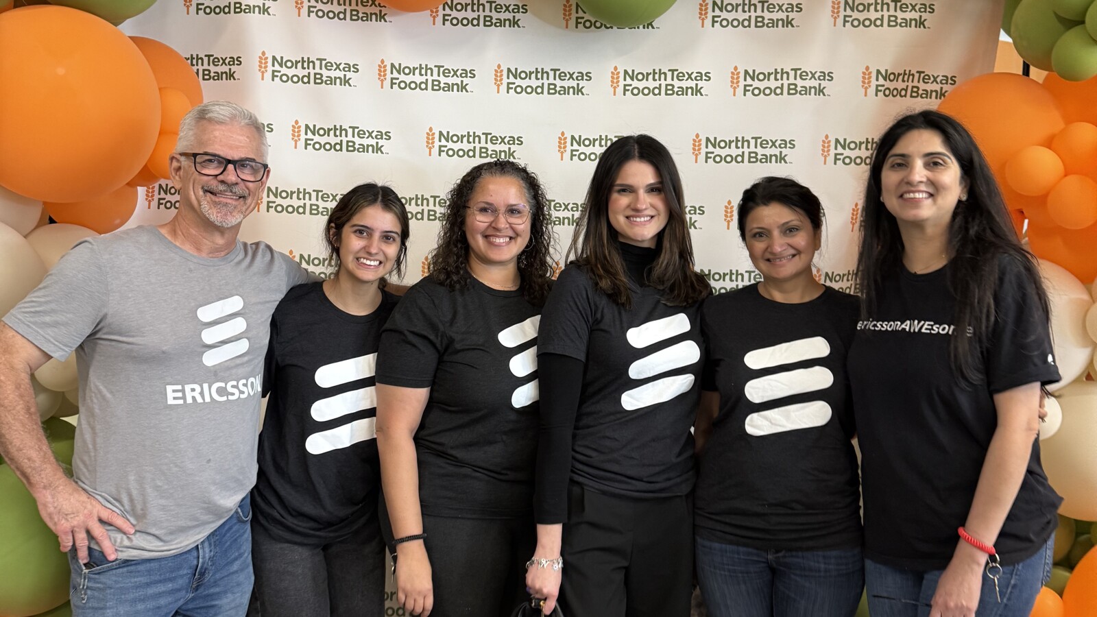 Nicole and the team volunteering at the North Texas Food Bank