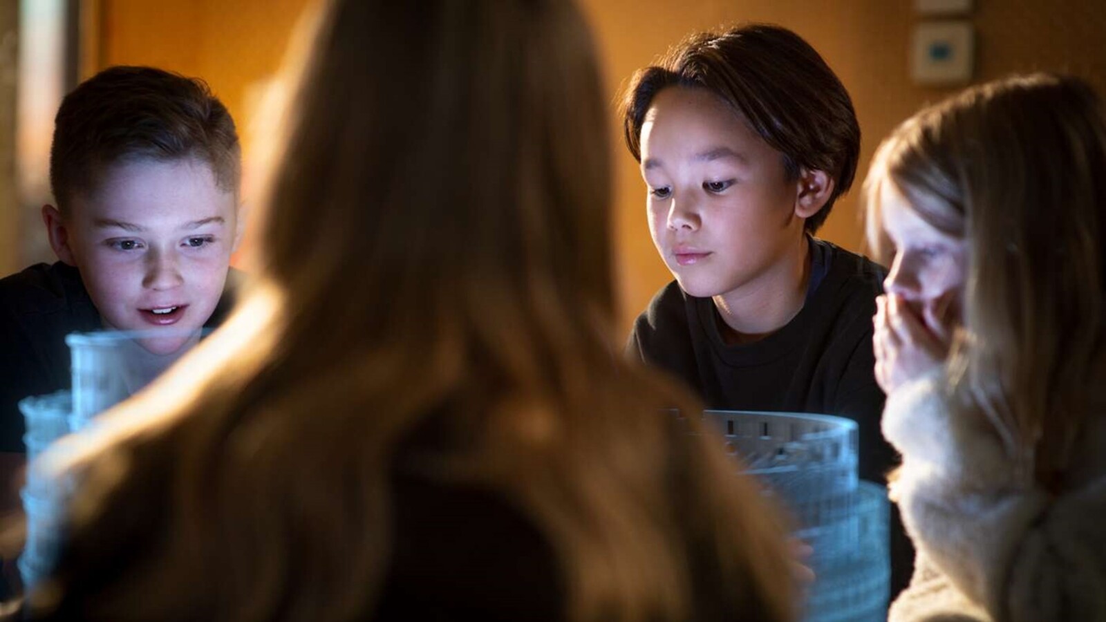 Kids looking at a simulation