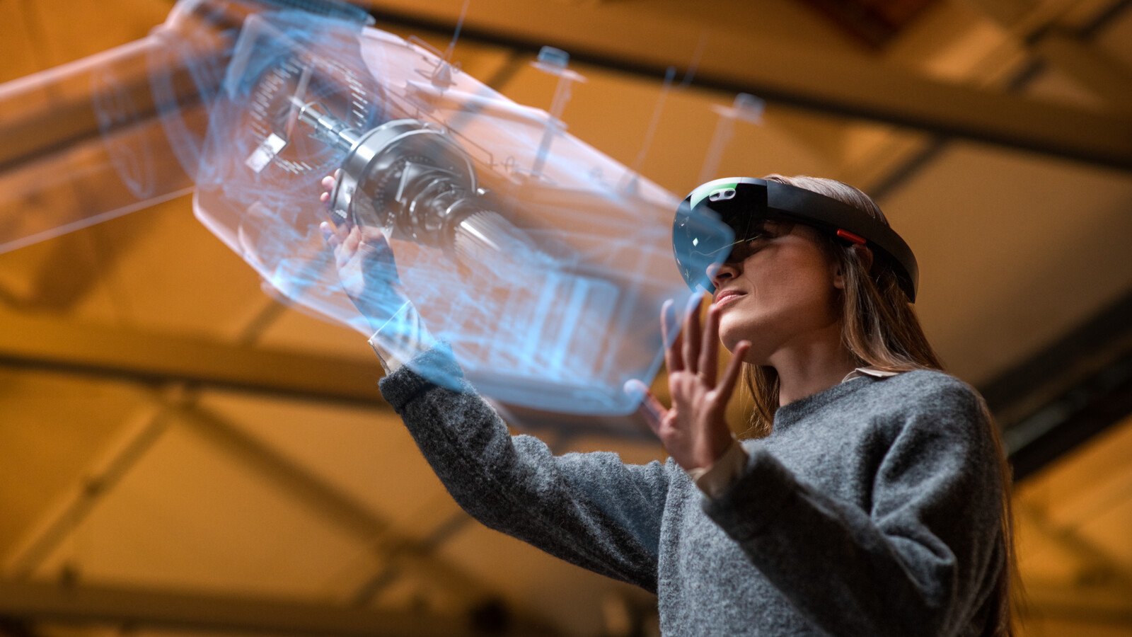 A Female professional working with 5G digital twin technology and industry 4.0