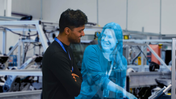 Woman and man having a virtual holographic meeting