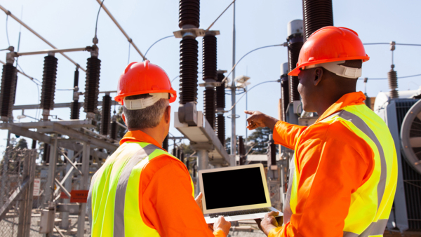 Two men in hard hats