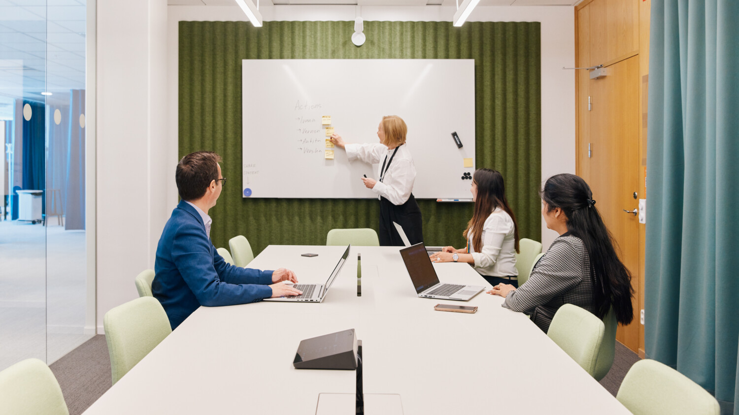People working on whiteboard