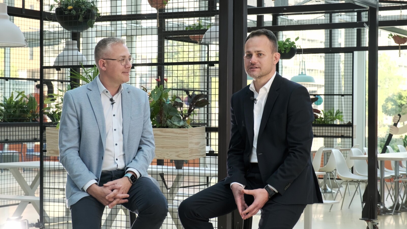 Odido tech hub video by Johan van den Branden, CNO at Odido, and Fatih Noyan