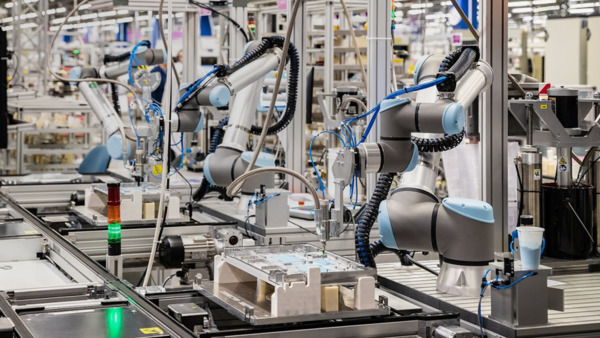 Three robot arms in action - 5G Factory Tallin