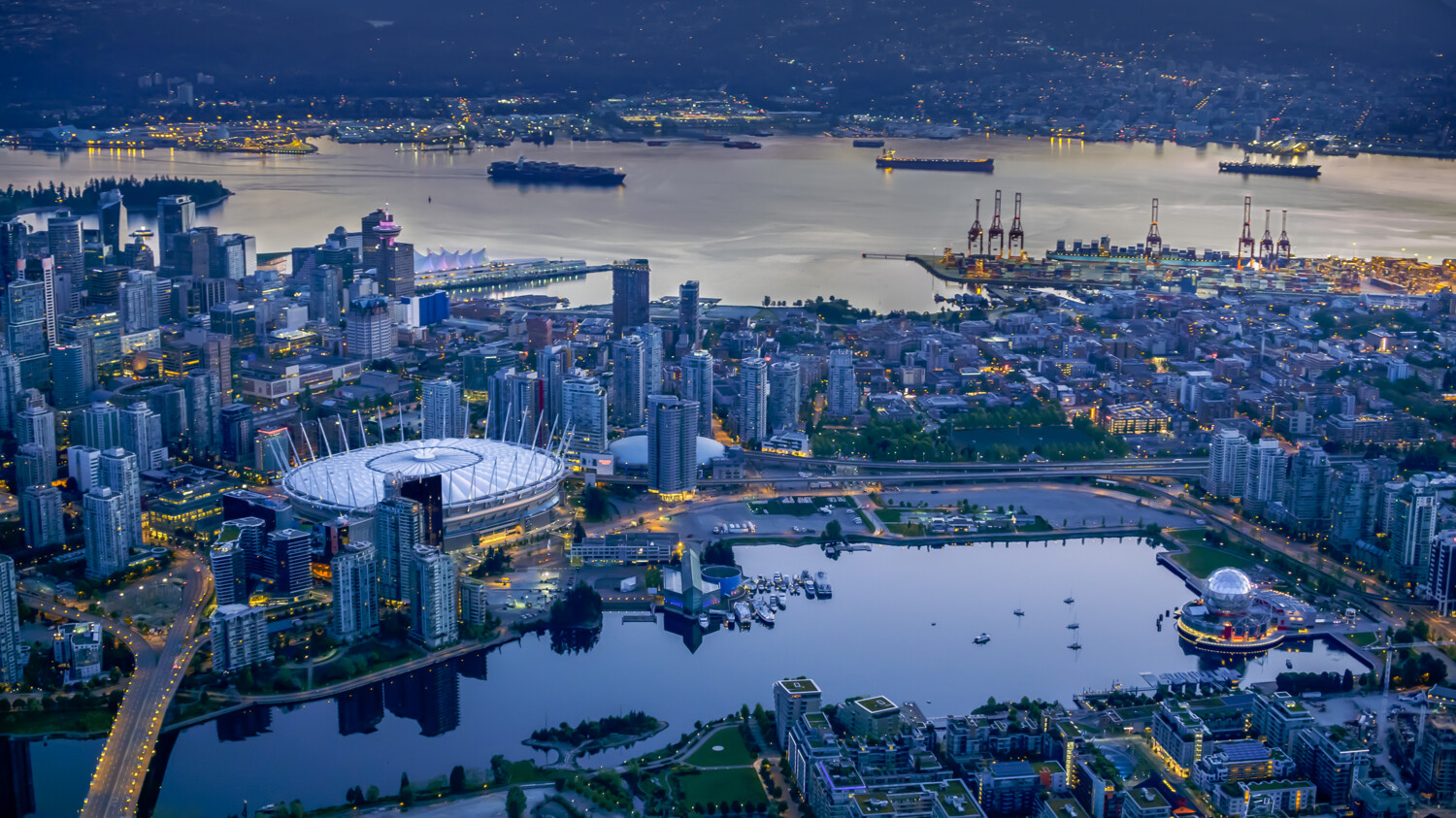 Vancouver from above with harbor, city center and stadium.