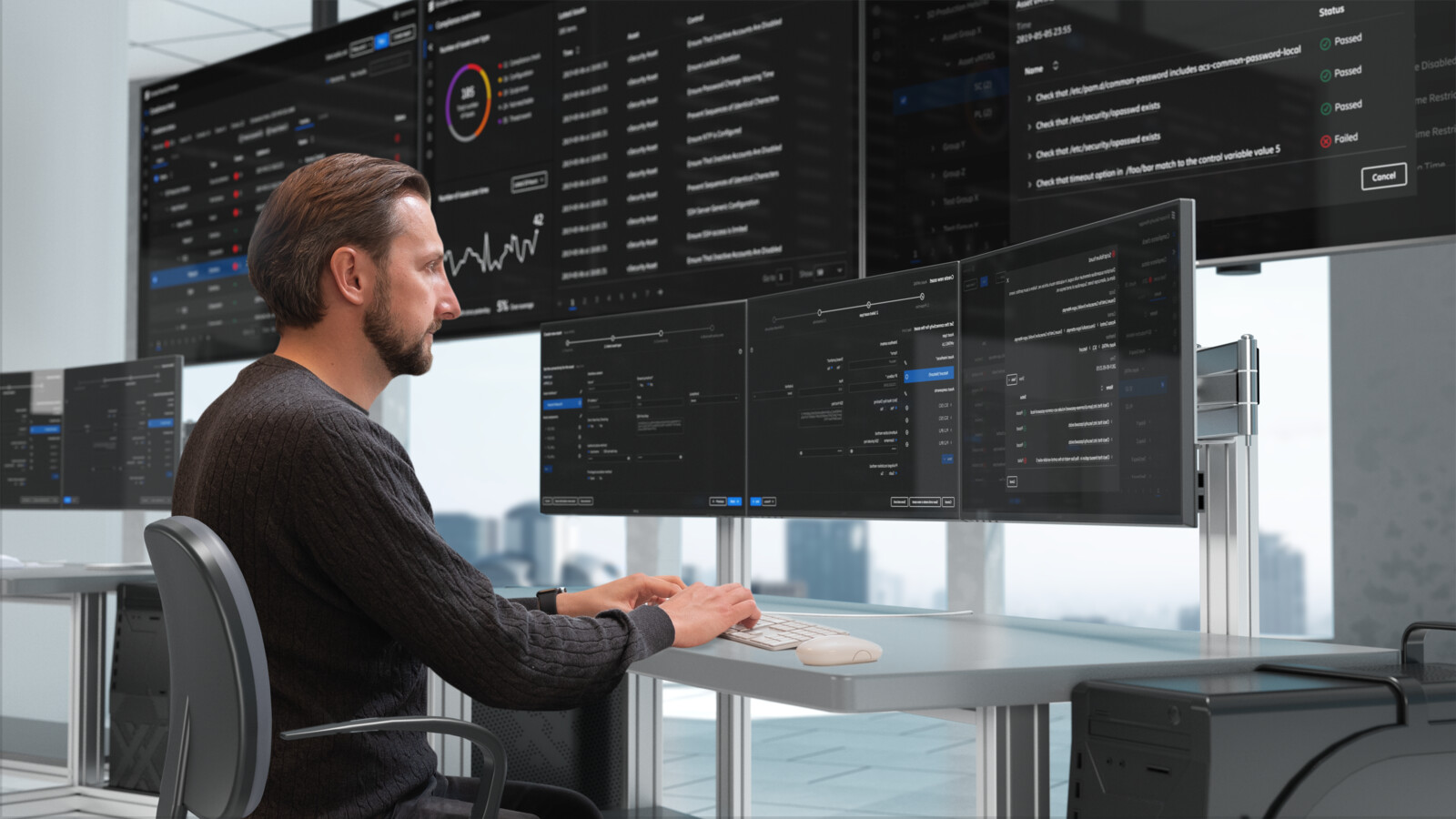 Man in SOC room monitoring Ericsson Security Manager