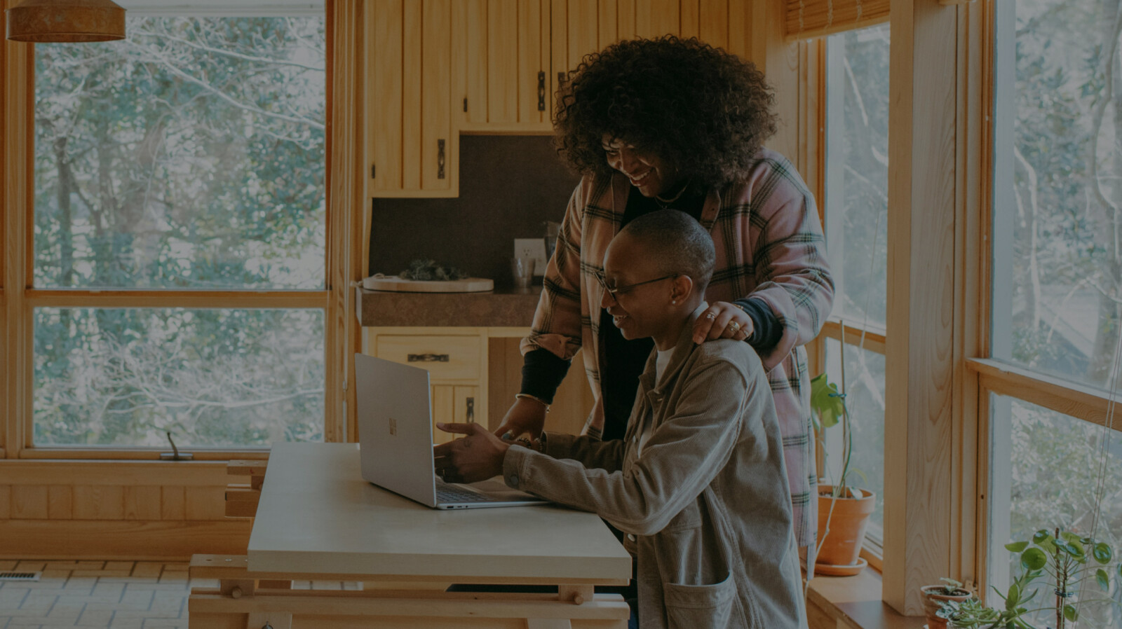 Couple looking at laptop