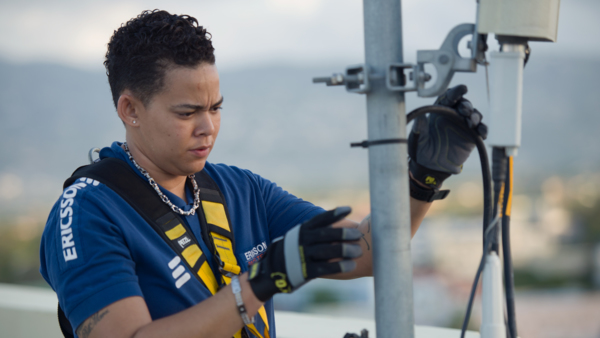 Ericsson engineer installing mobile network equipments